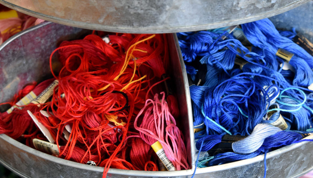 Close up of red and blue thread. Image by Mark Almond.